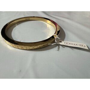 Coach Gold-Tone Signature Logo Engraved Bangle Bracelet